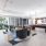 Spacious well lit resident lounge with billiards and ample seating 