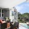 Large patio with a view of the pool 
