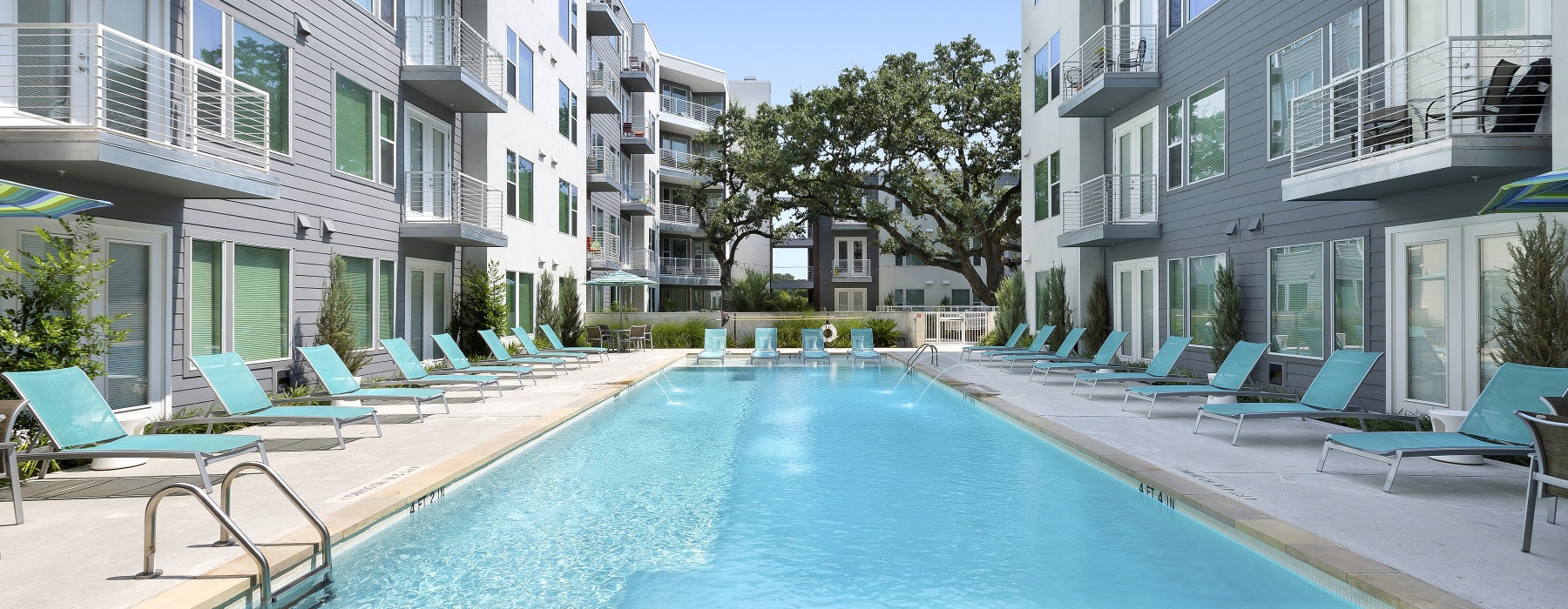 pool with lounge chairs
