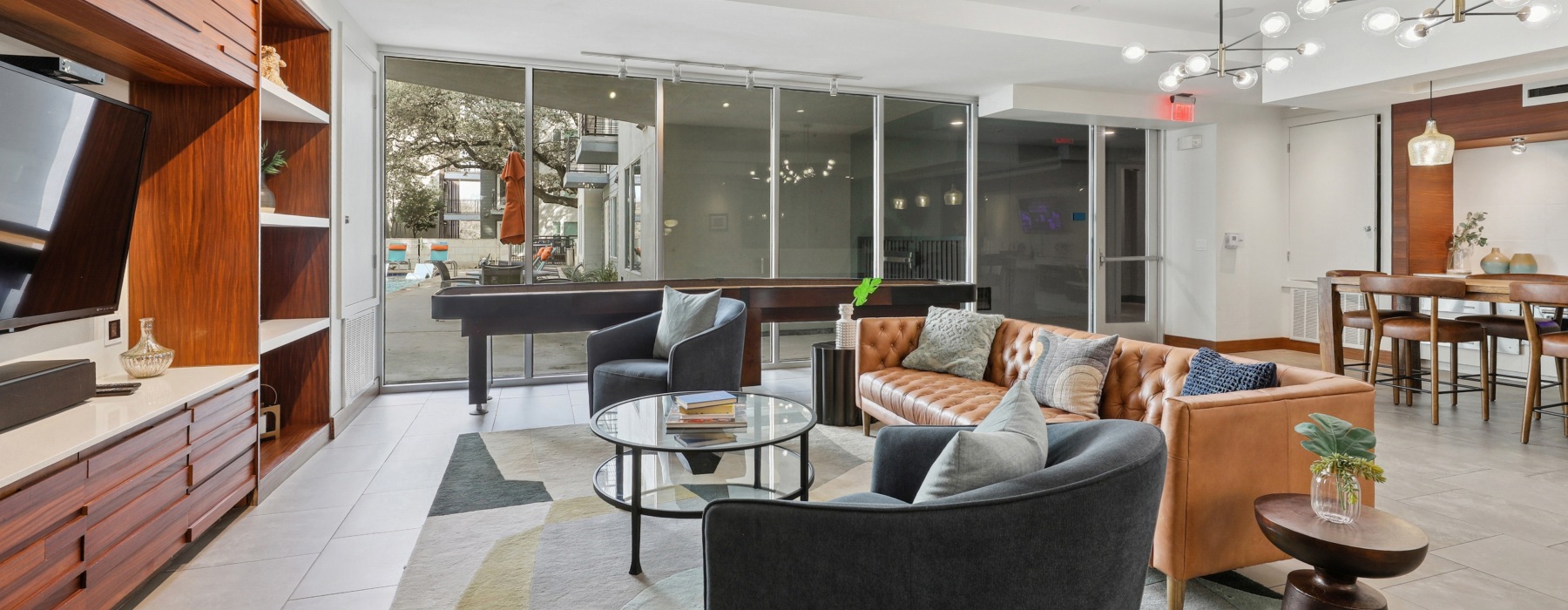 couch with tv and chairs