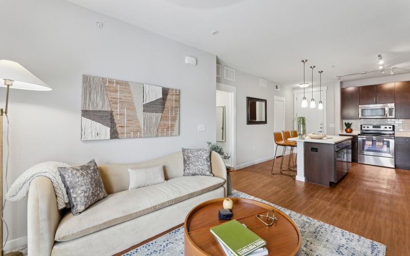 a living room with a couch and a table