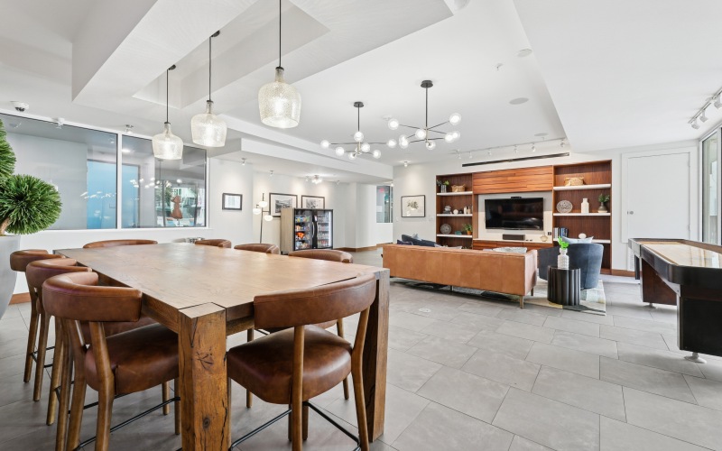 table with chairs and TV